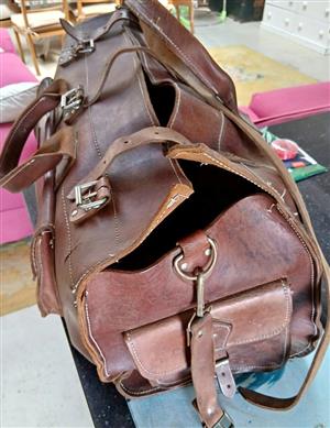 True vintage European  all leather bag for stylish weekend escapes.