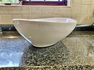 White oval countertop basin