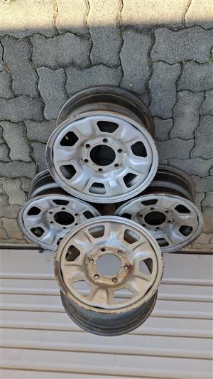 4 x15" Steel rims for Isuzu KB, Nissan or Toyota.