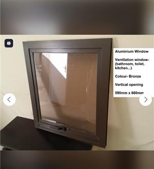 BRONZE-TOP HUNG ALUMINIUM WINDOW 