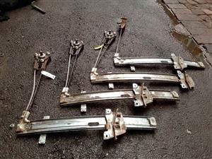 Mazda 323 left front window mechanism for sale