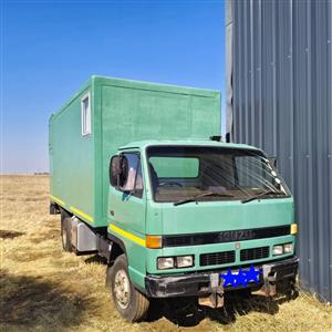 ISUZU N4000 truck with camper bin–ready for your next adventure
