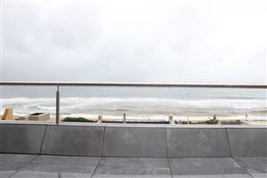 Step into luxury coastal living with this spacious 3-bedroom, 3-bathroom apartment