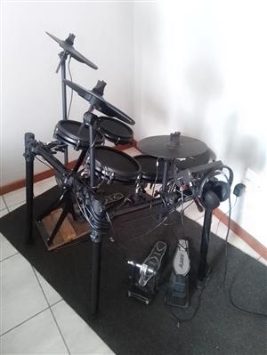 It is electronic drum kit for 12 and 1/2 thouR