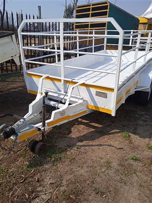 Double axle trailer with sides for sale