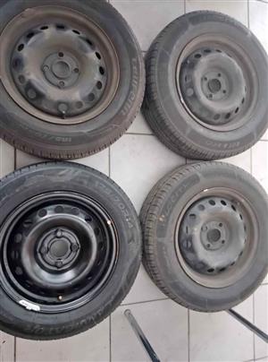 14 inch steel rims with Tyres for sell 4  by 100 pcd
