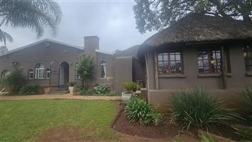 Charming Natural Art-Inspired Home with Wood-Design Ceilings