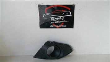 Chevrolet Spark front bumper left fog light grille