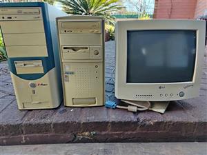Vintage computer towers and screen