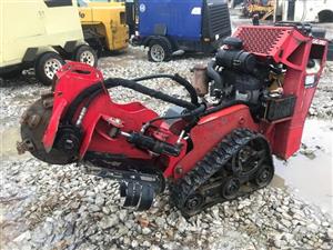 Reliable and powerful Toro STX-26 Stump Grinder in good working condition.