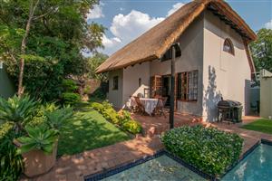 Charming Thatch-Style Double-Storey Family Home in a Secure Boomed-Off Area in Sunninghill