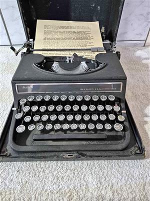 Vintage Olivetti Studio 42 typewriter, manufactured in Italy during the 1940s, with original case