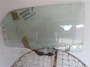 Mazda 2 right rear door glass original