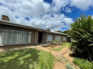 Charming Family Home with Versatile Spaces and Ample Outdoor Enjoyment