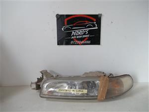 Mazda 626 93-97 L&R headlight with indicator (SET)