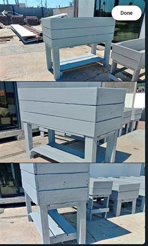 Painted raised planter with bottom shelf