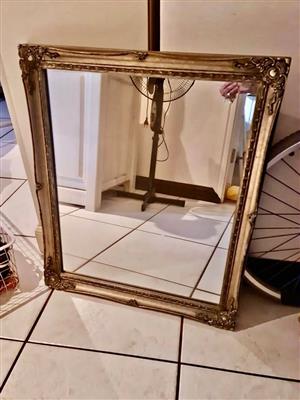Ornate framed mirror