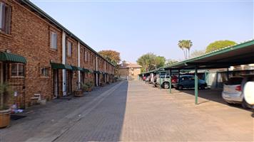 Price reduced on a  very neat 2 bedr town house in Rietfontein on sale