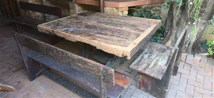 Solid sleeper wood patio table with benches