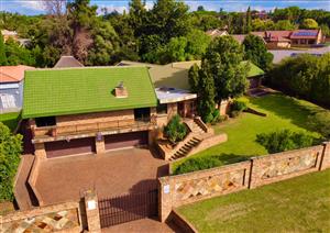 Spacious 5-Bedroom Family Home with Exceptional Kitchen, Extensive Garaging & Entertainment Areas