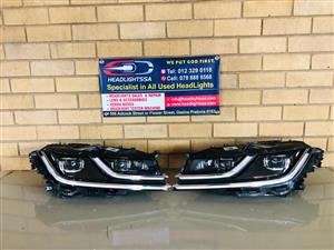 VW ARTEON LH AND RH HEADLIGHTS WITH CHROME TRIMMING