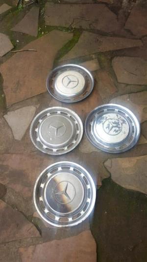 14" assorted mercedes hub caps as is