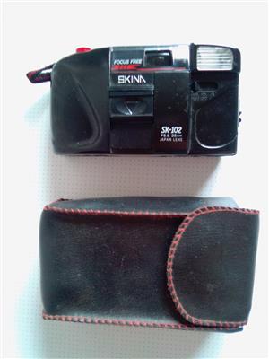 Film Cameras. Two to choose from. With carrying pouches..