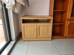 TV unit with rotating top table and cabinet underneath