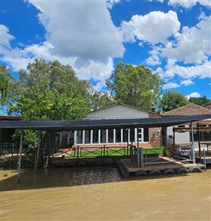 Exclusive 3-Bedroom Riverfront Residence