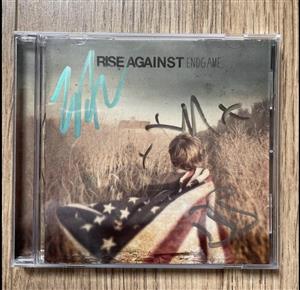 Rise Against autographed CD and poster