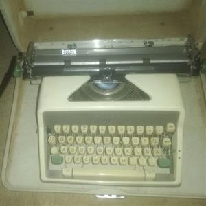 Antique typewriter in case for sale