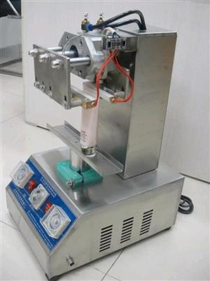 Tube sealing machines