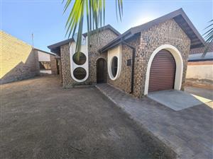 Spacious 3-Bedroom Home with 2-bedroom Cottage in Manhweng Unit C