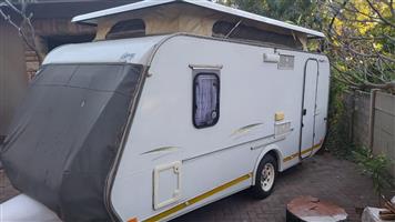 Gypsey Rhapsody Caravan with semi island bed and toilet