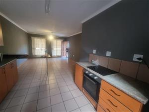 Two-bedroom townhouse with garage & carport