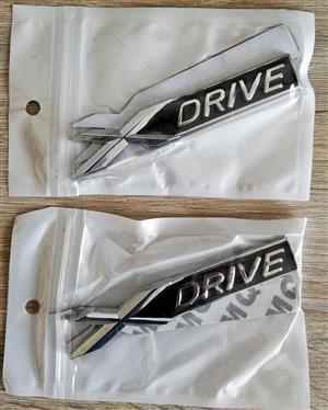 BMW X Drive badges emblems