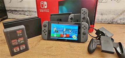 NINTENDO SWITCH V2 - GREY 32GB + 128GB SD CARD + 5 GAMES IN ORIGINAL BOX   CASH ON HAND SALE