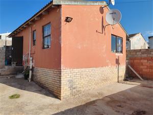 Open-Plan 2-Bedroom Home with Renovation Opportunity