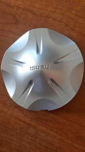 ISUZU CENTER CAPS. BRAND NEW. FOR VARIOUS OTHER CARS TOO.