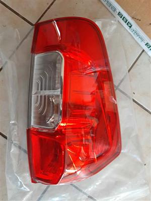 NISSAN NAVARA SINGLE CAB TAIL LIGHTS. ORIGINAL. R1500 EACH. BRAND NEW. FOR VARIOUS OTHER CARS TOO