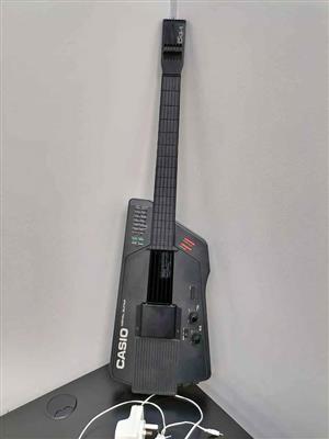 Casio DG-1 Vintage digital synthesizer Guitar, neat Condition