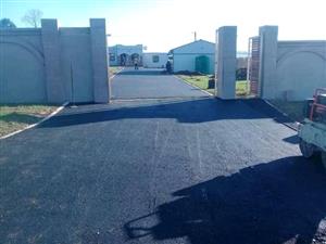 TAR SURFACING DRIVEWAYS, ROADS AND PARKINGS 