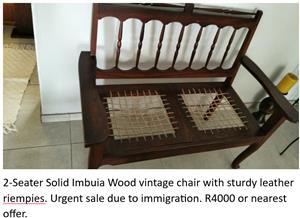 2-Seater Solid Imbuia Wood vintage chair with sturdy leather riempies.