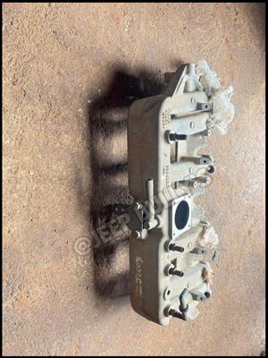 Jeep Cherokee ZJ Exhaust Manifold For Sale.   