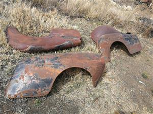 1946 Ford wheel fenders two rear and only one front trade or for sale