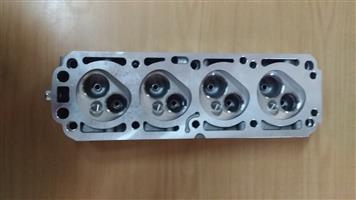 Opel Corsa Gamma new cylinder head & spare parts for sale 