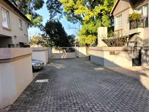 "Spacious Townhouse For Sale in Pretoria North, offering modern finishes and a convenient located.