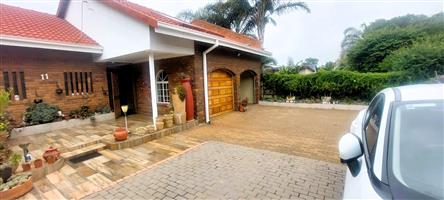 Spacious 4-Bedroom Family Home with Pool and Modern Kitchen