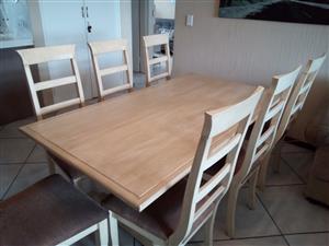 Hand crafted, solid wood 8 seater dinning room table.