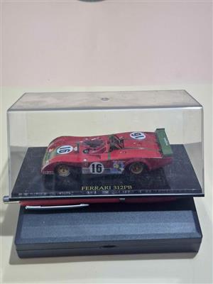 1:43 scale diecast model is a Ferrari 312PB from the Eaglemoss or Altaya Ferrari Collection.